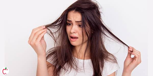 زنی که موهایش آسیب دیده است | علت آسیب های مو | سیوطب